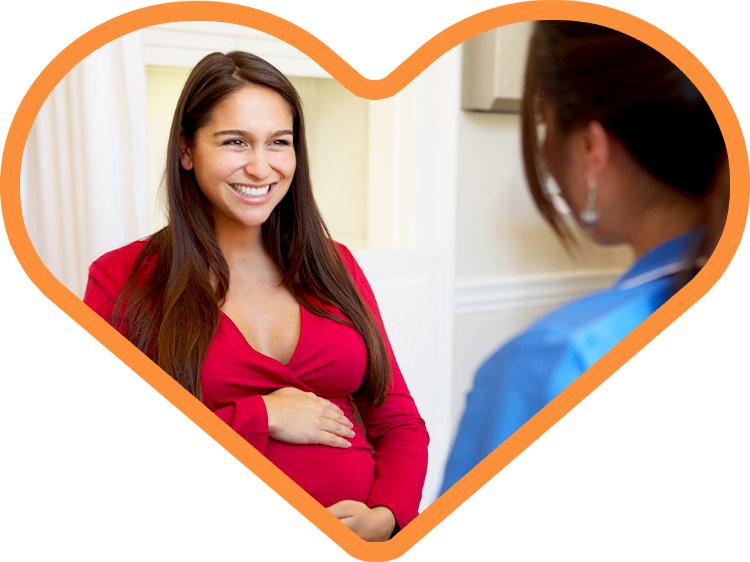 Photo of Hispanic mother and a healthcare professional in an orange heart