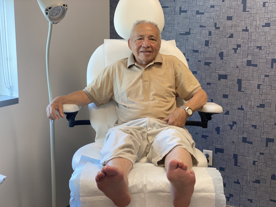 Wound care patient sitting in a chair.