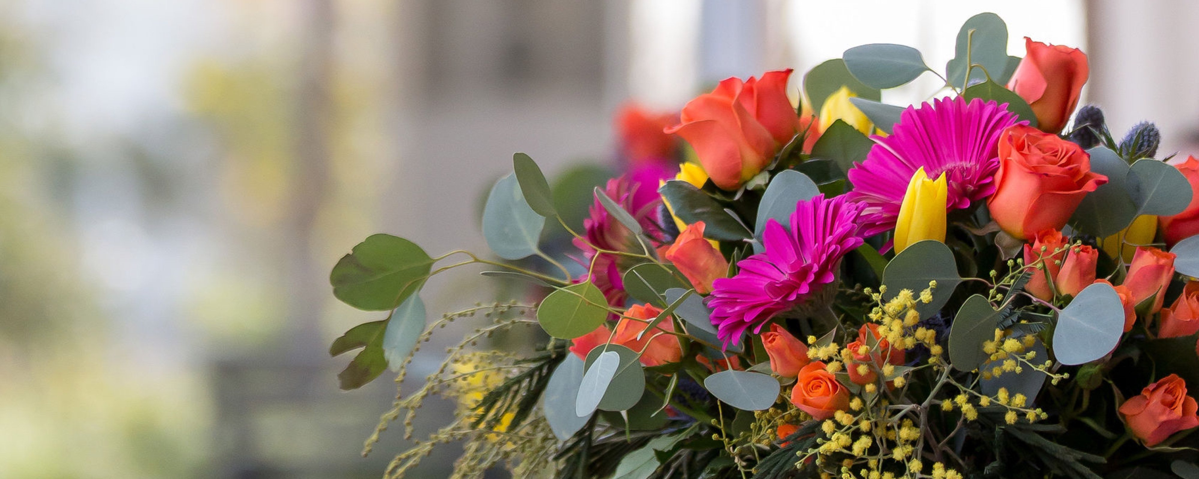 Close up of pink and orange floral arrangement