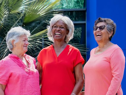 Photo of three senior women laughing