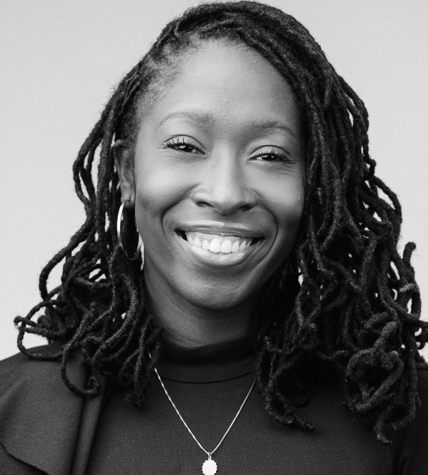 Black woman with braids smiling