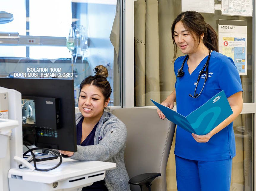 Doctor and nurse smiling